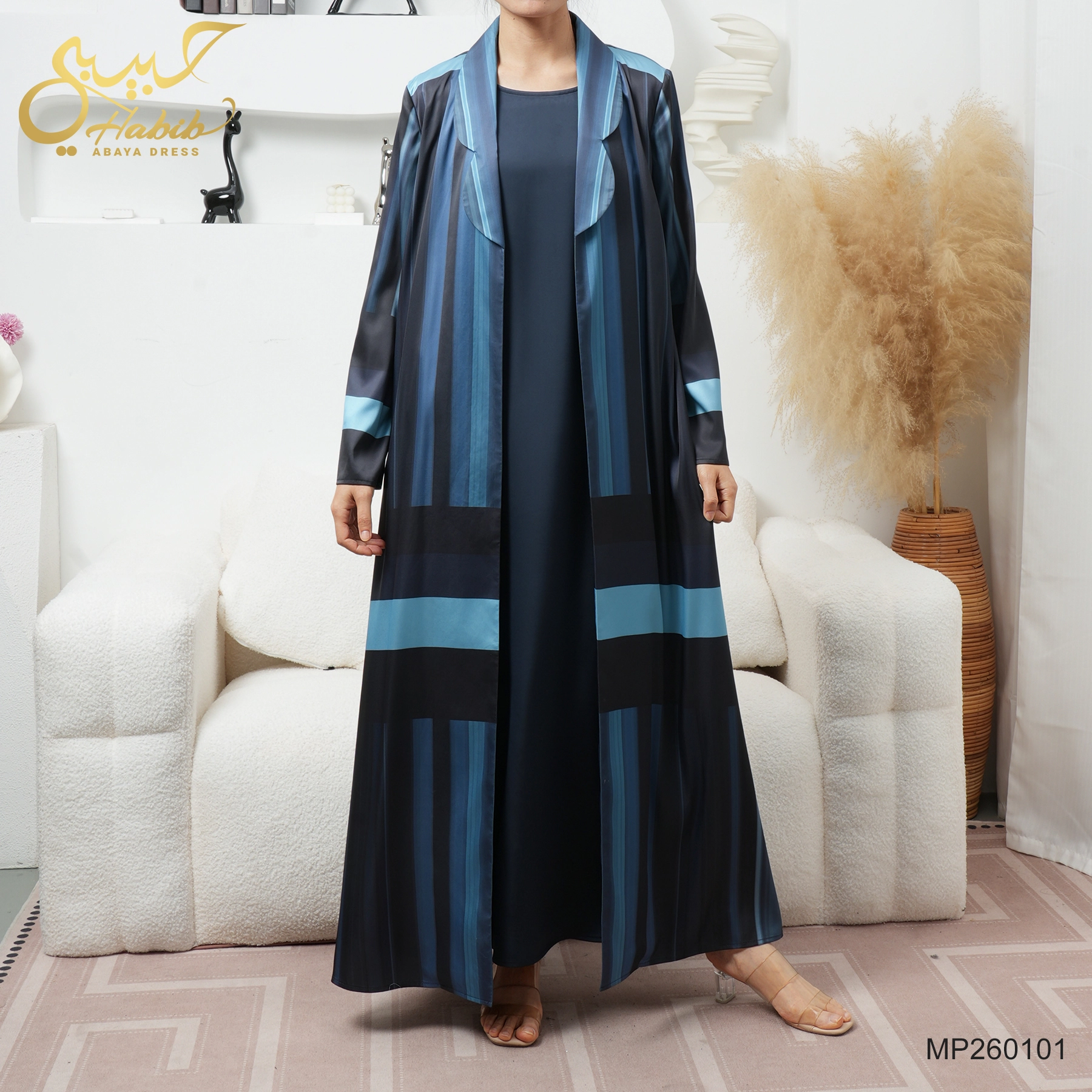 Скромный кардиган из двух частей с геометрическим полосатым узором и открытой спинкой, дополненный платьем без рукавов. 1