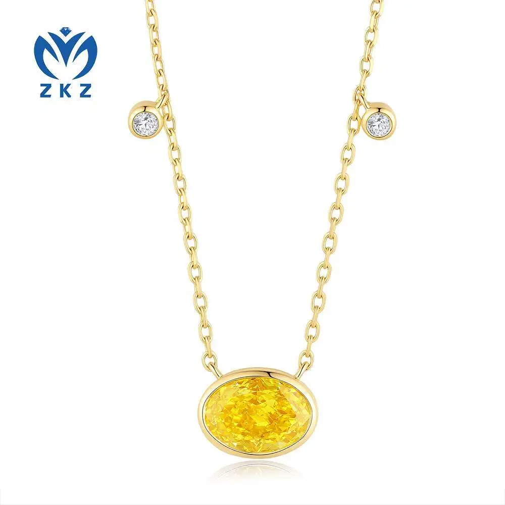 14K gold oval-cut vivid yellow cultured diamond necklace with full setting of main stones and floating white diamonds as accents. 1.090ct, VS. ZKHZ017 1