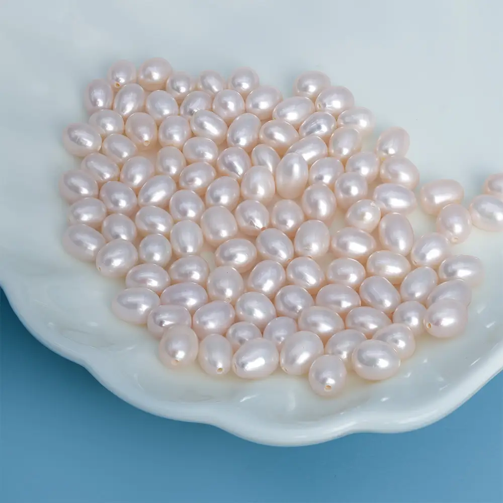 Perlas sueltas de agua dulce con forma de grano de arroz de grado 5A, de 9-10 mm, para la fabricación de joyas. 1