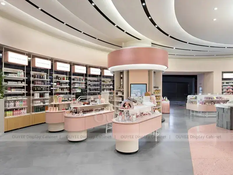 متجر تجميل وردي اللون ذو تصميم مقوس وعداد منحني 1