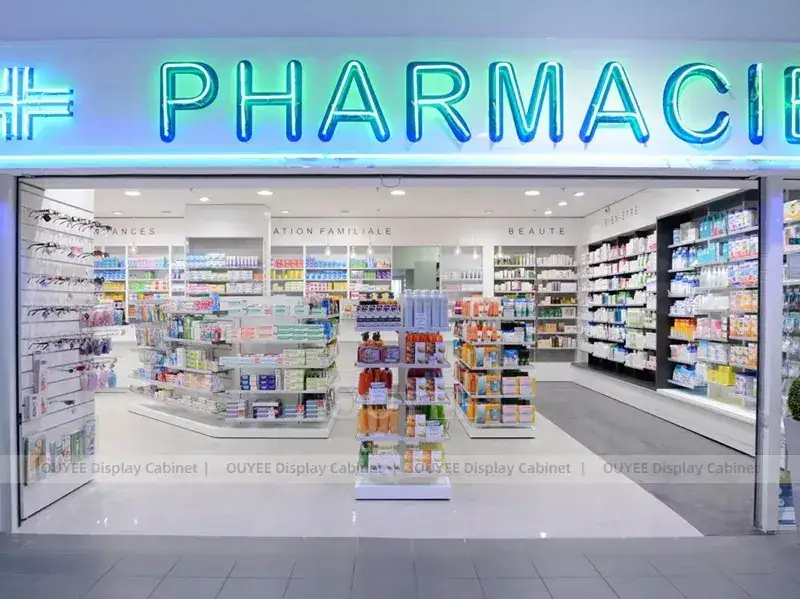Apothekenregal mit orangefarbenen Akzenten und rundem Mitteldisplay 1