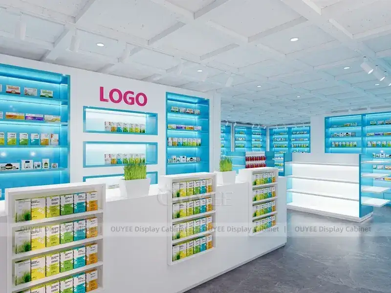 Blau beleuchtete Apothekenregale mit weißem Kassentresen 1