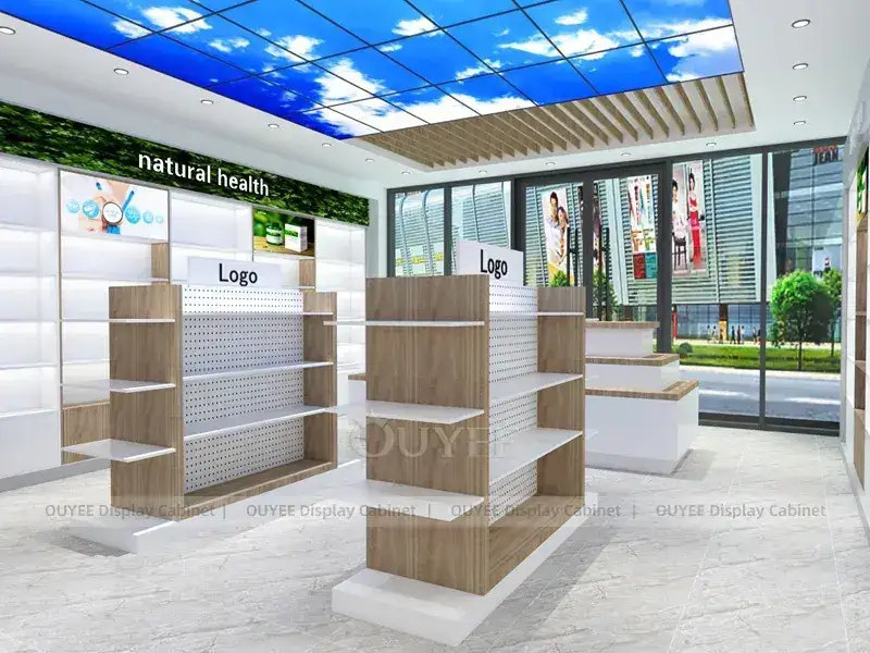 Interno di una farmacia con soffitto azzurro cielo e gondole bianche 1