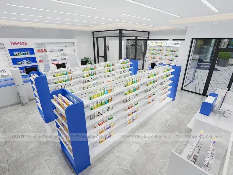 Blaue Gondelregale in der Apotheke mit weißen Regalen 1