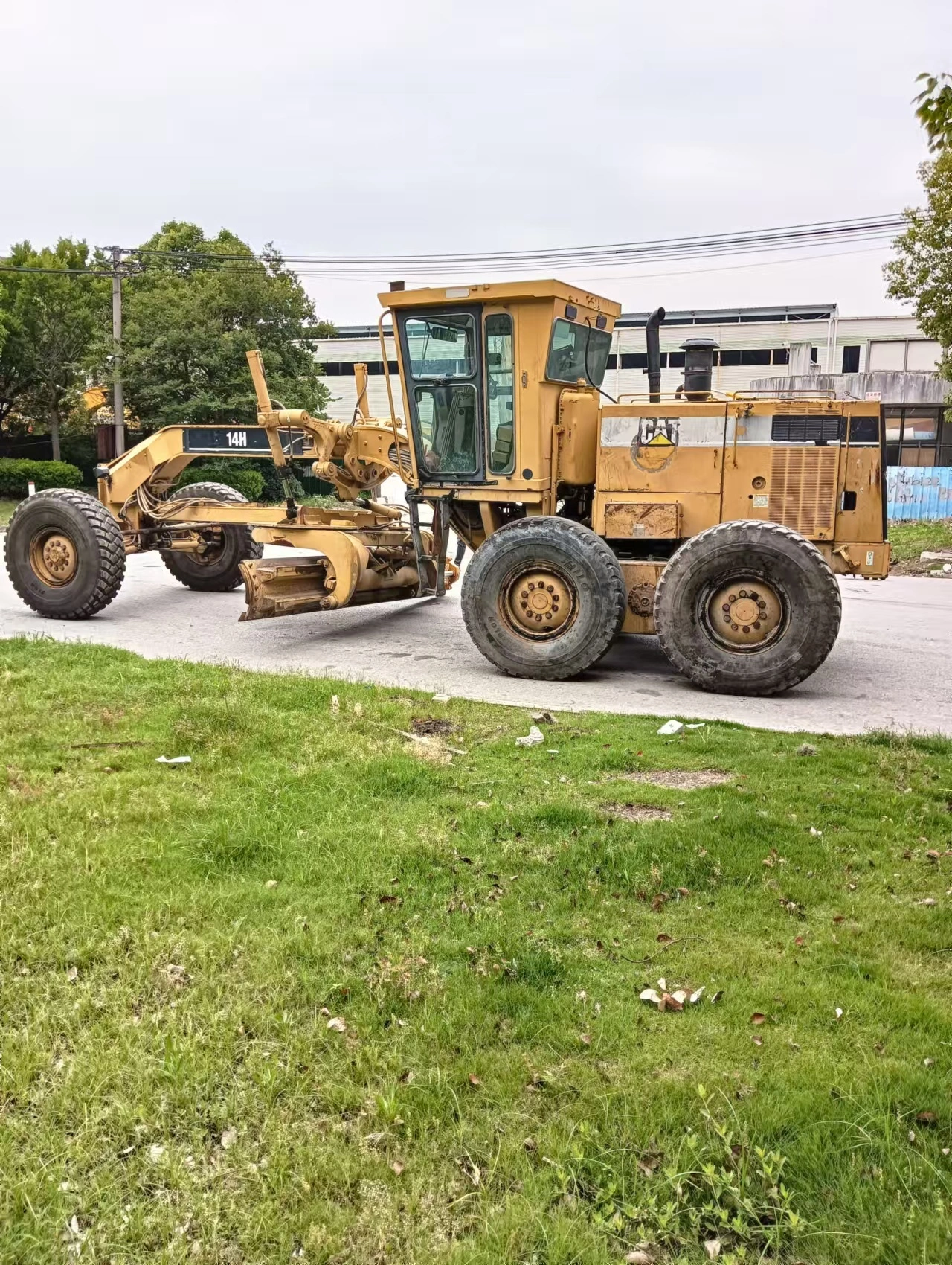 جرافة تسوية كاتربيلر 14H أصلية مستعملة عالية الأداء للبيع 1