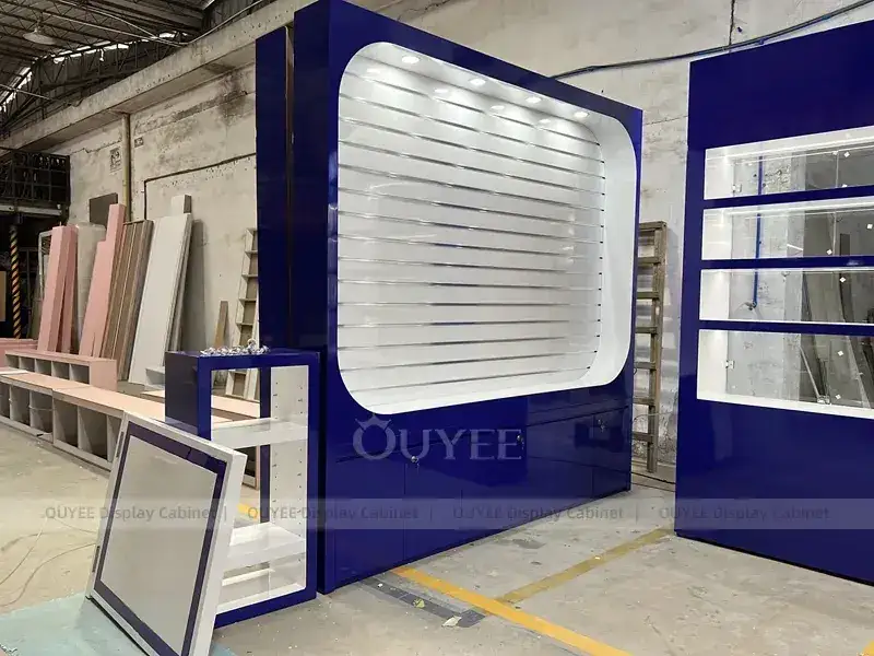 Comptoir vitrine pour téléphones portables en bois et verre bleu avec vitrines transparentes 1