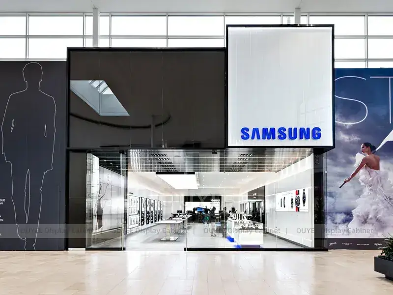 Espositori a LED in bianco e nero per negozi di telefonia mobile con eleganti display a parete illuminati. 1