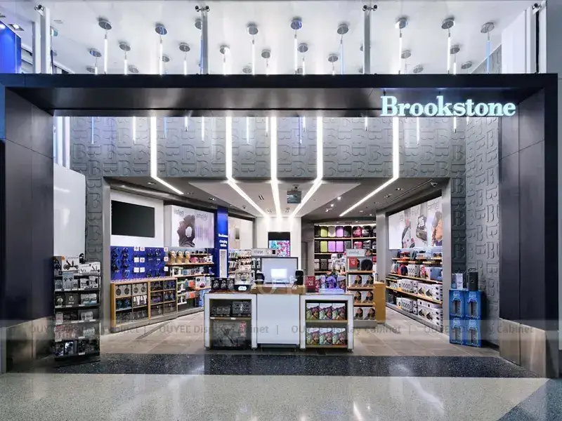 Présentoirs pour boutiques de téléphonie mobile aux tons bois et LED bleues, avec éclairage mural froid. 1