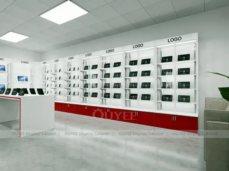 Présentoirs blancs et rouges pour boutiques de téléphonie mobile avec étagères murales rétroéclairées, destinés aux opérateurs de téléphonie mobile. 1