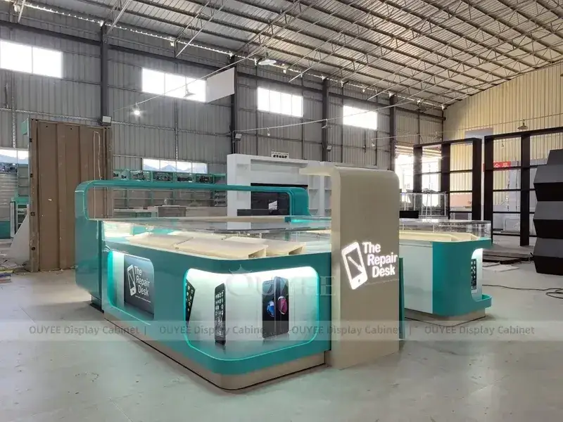 Présentoirs muraux à éclairage LED turquoise et bleu pour boutiques de téléphonie mobile en centres commerciaux. 1