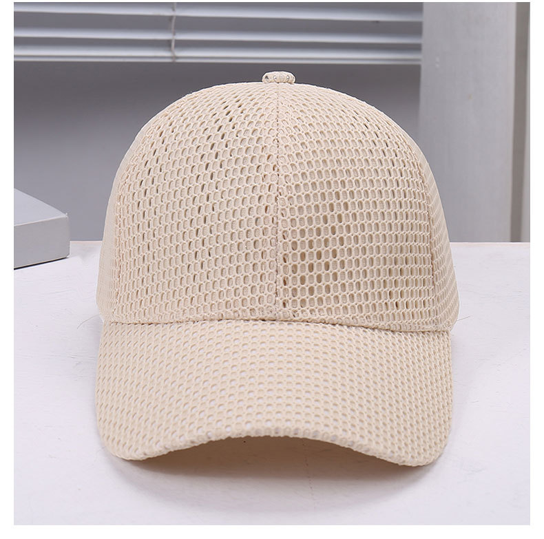 White mesh baseball cap viewed from the front and side with a curved brim