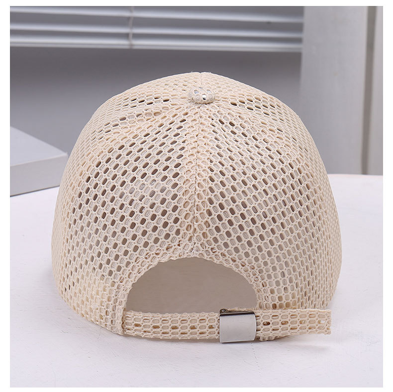 Rear view of a beige mesh cap showing the back opening and adjustable strap with a metal clasp