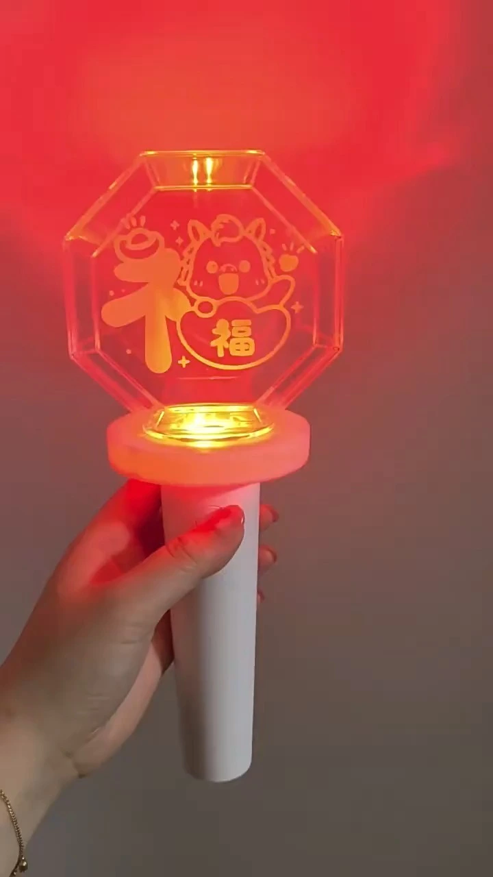 Video of handheld 3D shaped LED light stick showing red glowing top and button control