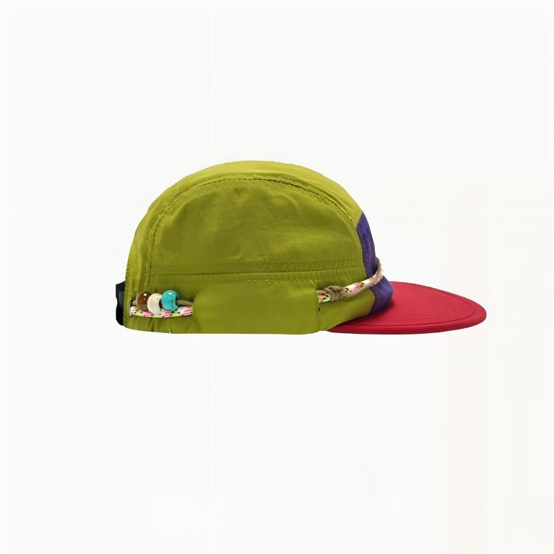 Side view of a green and red camper cap with decorative cord, colored beads and a rear strap.