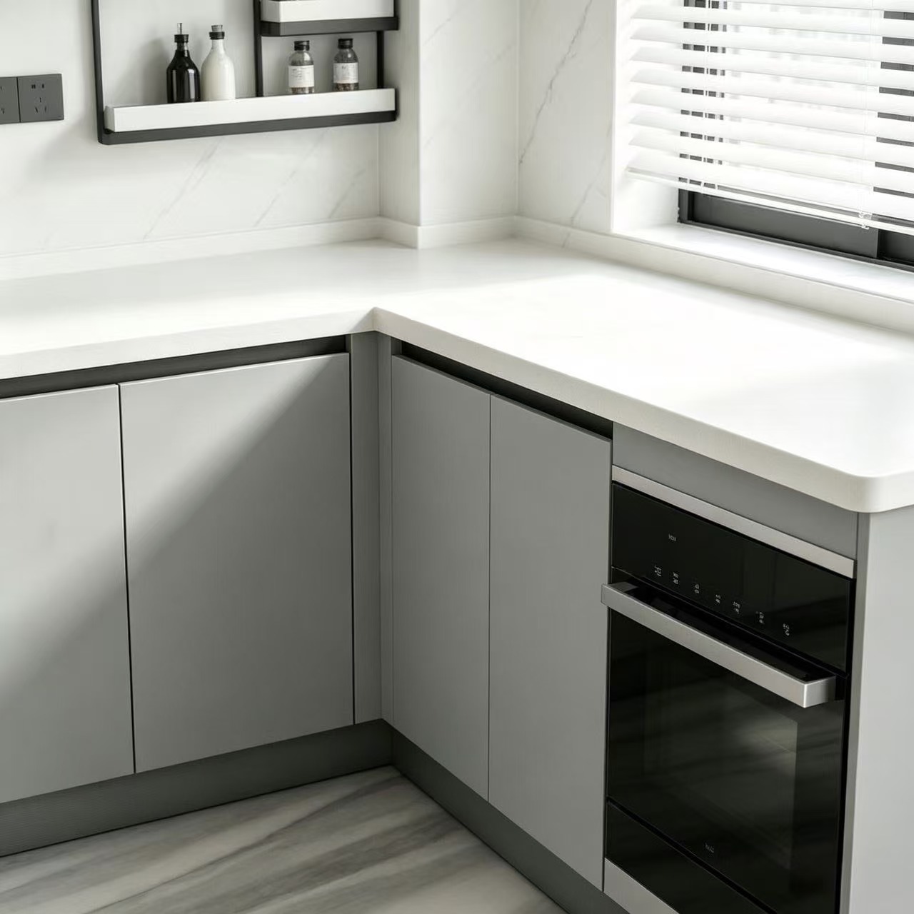 L-shaped gray kitchen cabinet 