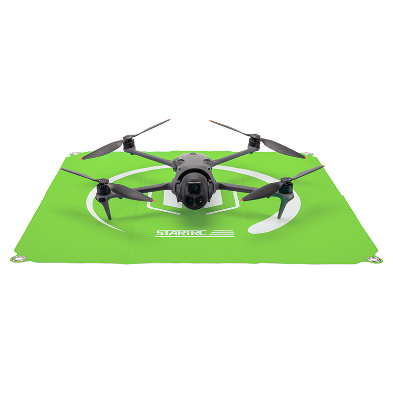 Blue and green foldable drone landing pad