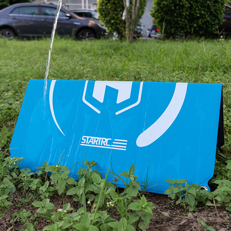 Fold lines on portable square drone landing pad