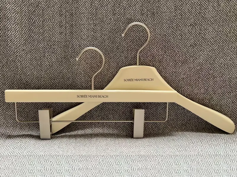 Luxury warm white coat hanger with custom logo 1