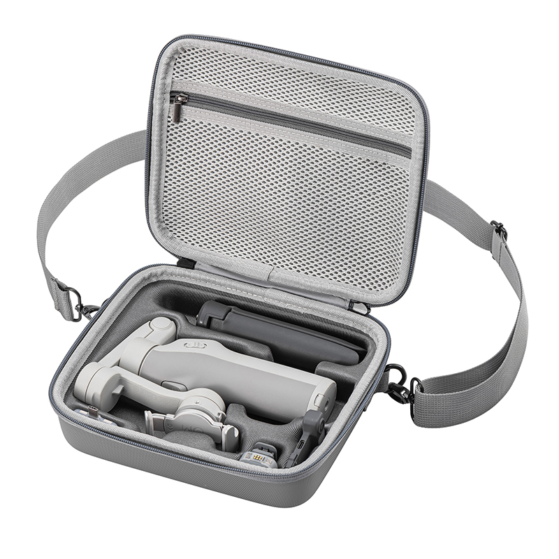 Compatible DJI OM gimbal stored with magnetic phone clamp attached