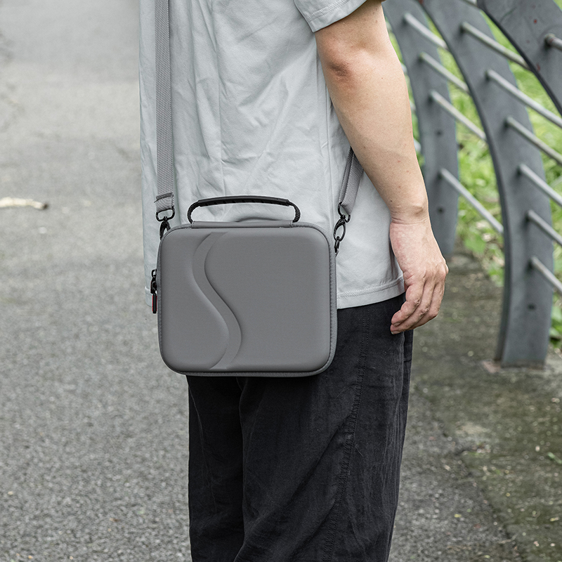 Lid mesh pocket holding cables and small accessories
