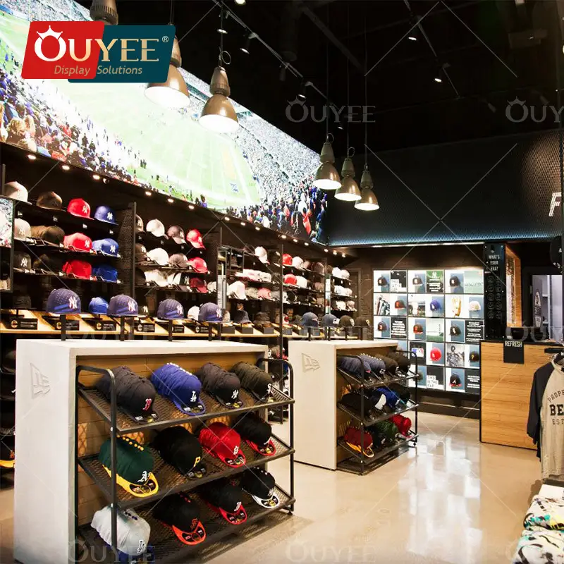 Maßgefertigte goldene Verkaufsständer – Ladeneinrichtungen &amp; Bekleidungsgeschäftmöbel 1