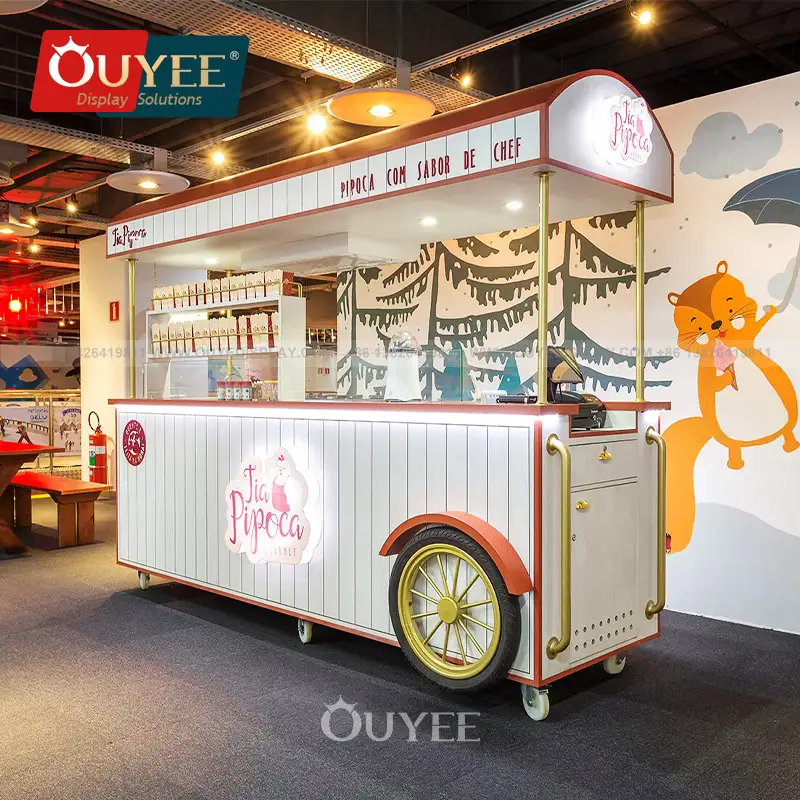 Maßgefertigter LED-Lebensmittelkiosk aus Holz und Metall, Süßwaren-/Blumenpräsentationswagen für Einkaufszentren 1