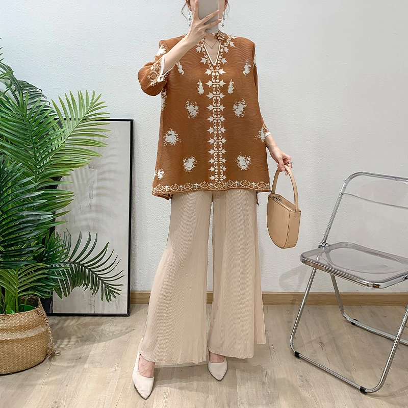 مجموعات Miyake Pleated Women's Women 2025 Summer Style New Fashion قميصًا جديدًا وتنورة مجموعات من قطعتين 1