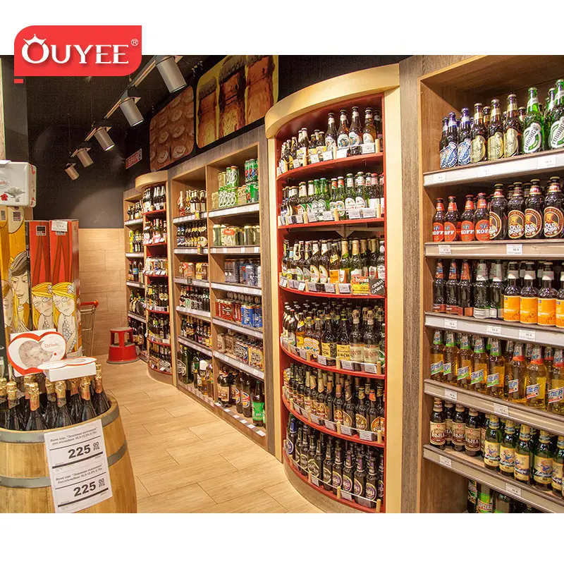 Scaffalatura in legno per negozio di vini e liquori con bancone espositivo per whisky. 1