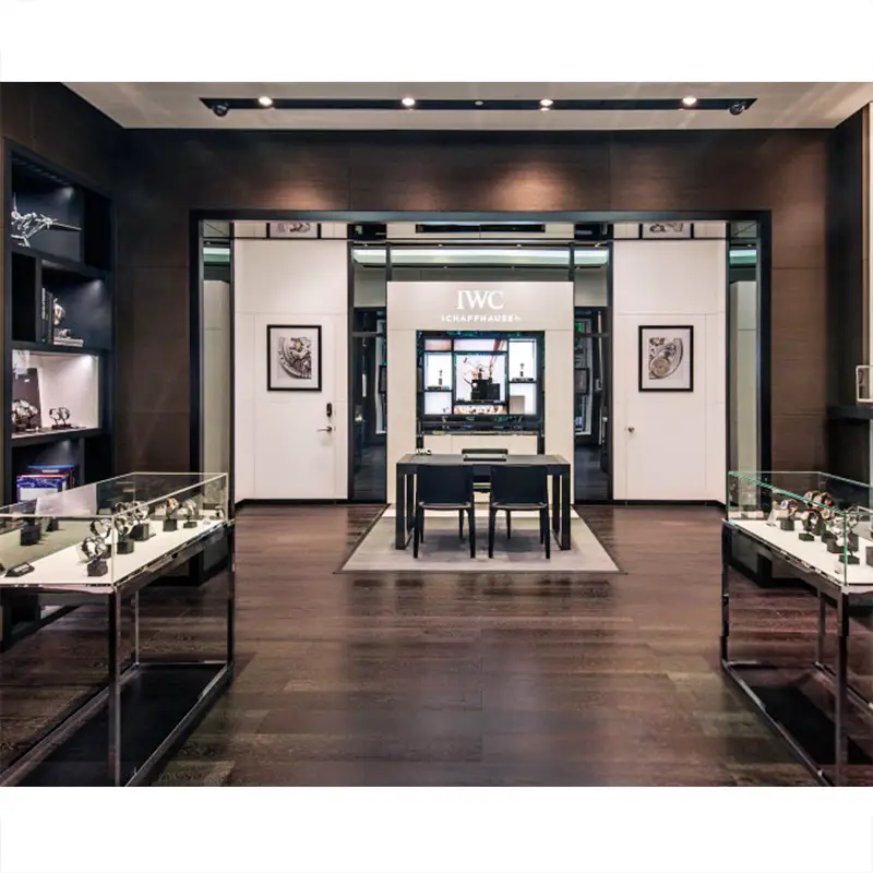 Meuble d'exposition mural en bois pour montres, destiné à l'aménagement intérieur d'un magasin. 1