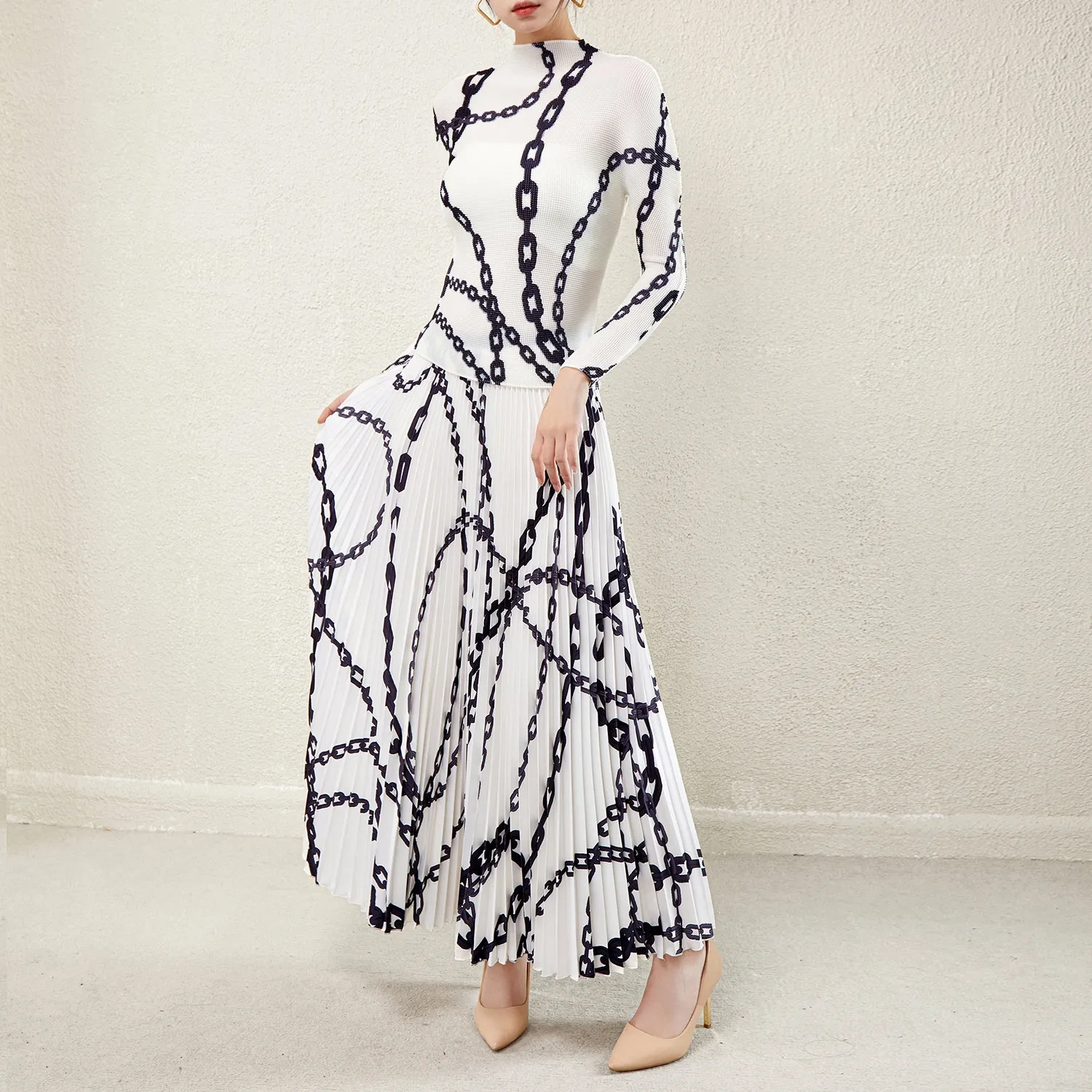 Wholesale Selection: Stylish and Versatile Pleated Skirt Suit, Ample Stock Available The Latest  Pleated Printed Design Women's 2-piece Long Sleeved Shirt And Printed Long Pleated Skirt Set 1