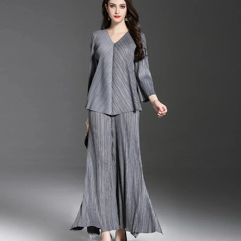 Plis fabricant de vêtements femmes ensemble plissé col en v deux pièces ensembles femmes hauts irréguliers taille haute plis cloche-bas pantalon 2024 nouvel ensemble de grande taille 1