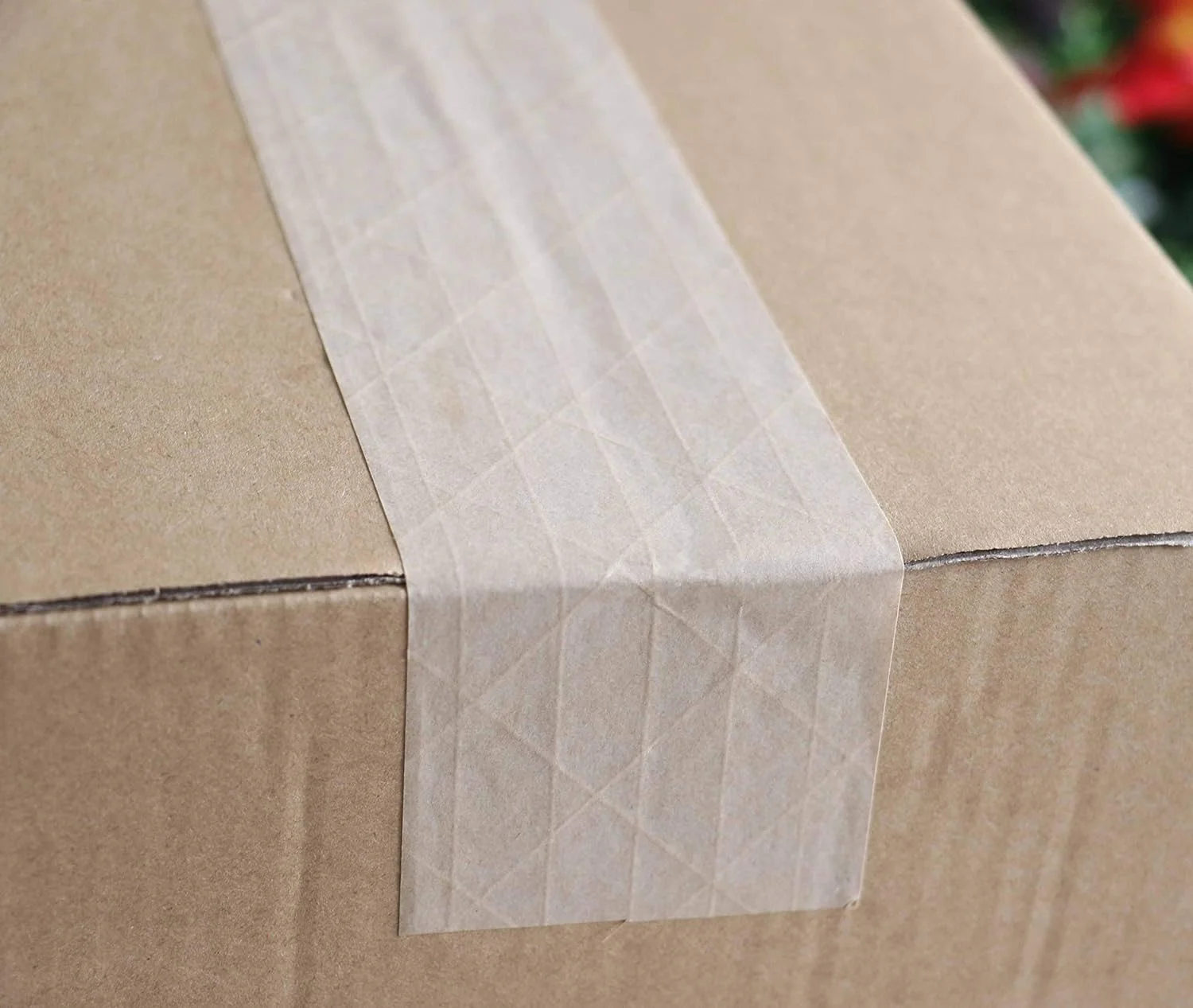 Ruban d'emballage en papier kraft renforcé de fibre de verre activé par l'eau 4