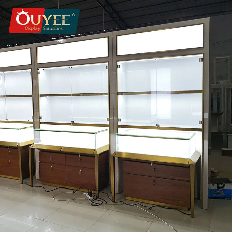 رفوف عرض مجوهرات مخصصة - واجهة عرض زجاجية - طلاء ذهبي 1