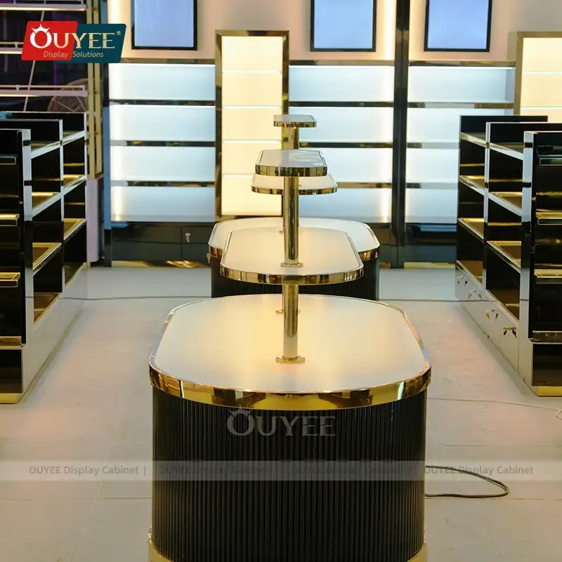 Mobiletto per profumi e espositore per prodotti da negozio duty-free. 1