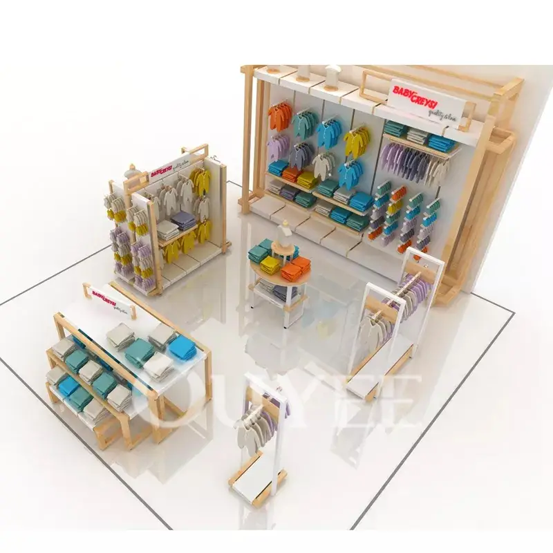 Quiosque de shopping com design exclusivo para loja de artigos infantis, expositor para roupas de bebê. 1