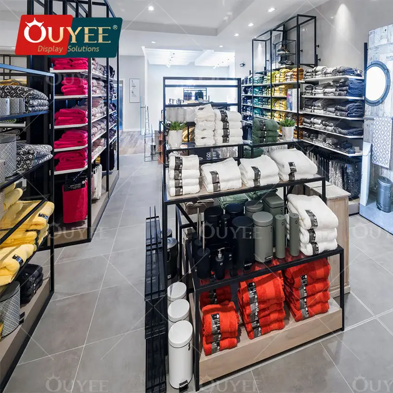 Progettazione personalizzata di negozi al dettaglio e soluzioni di allestimento per interni di negozi di abbigliamento. 1