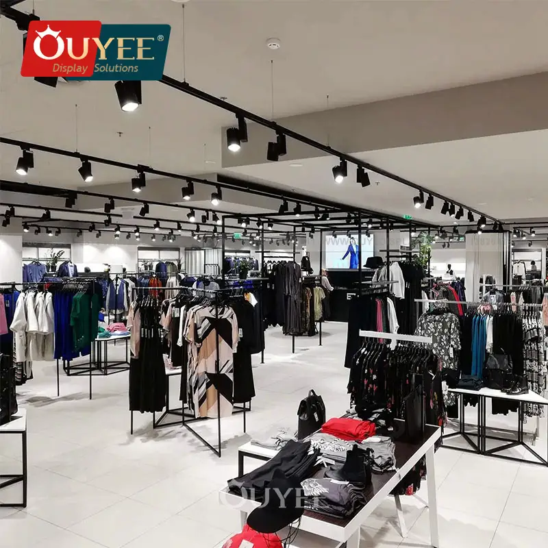 رف عرض ملابس أرضي معدني غير لامع مزود بإضاءة LED 1