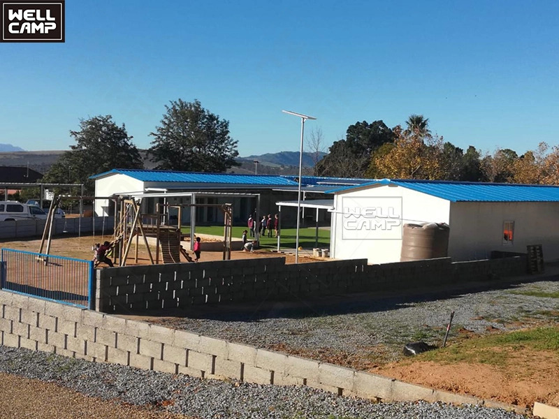 WELLCAMP affordable firm prefab T house USA project prefab school building design recyclable durable steel modular houses 1