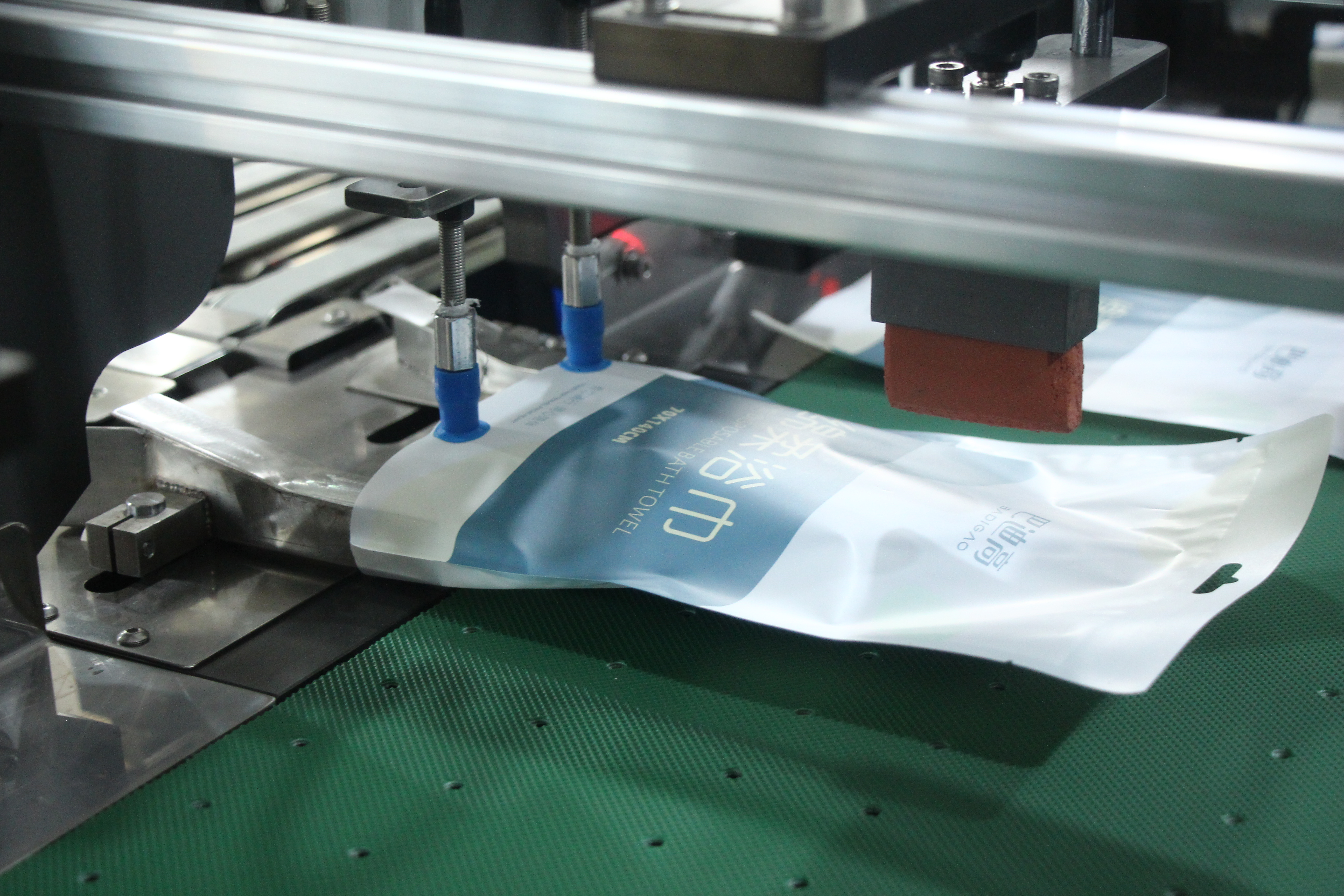 Quality Customized Automatic Bagging Machine for Slippers Bath Towel Manufacturer | Xingke 7