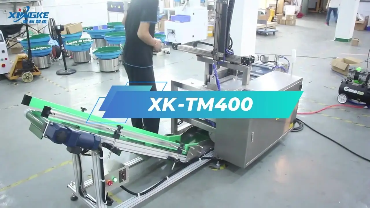 XK-TM400( lighting senitary accessory Cylinder film packaging machine) 1