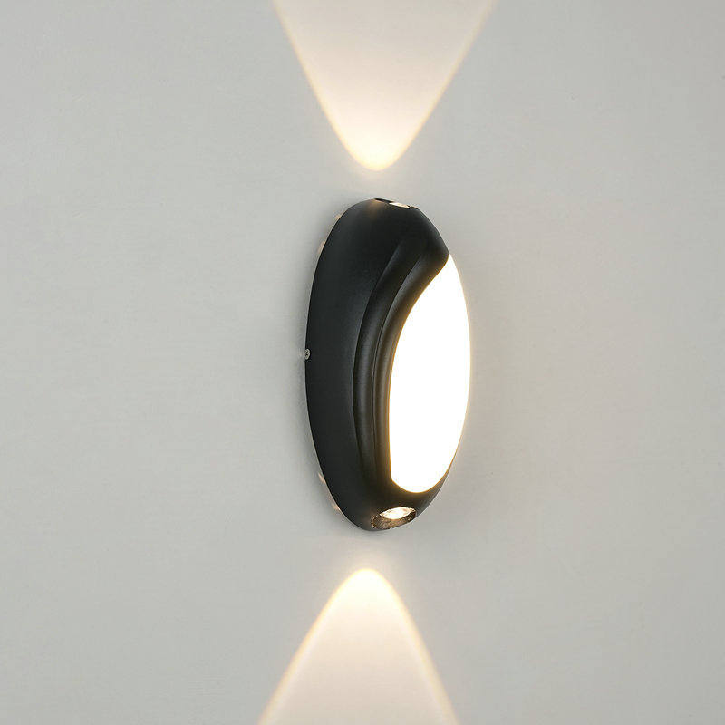 مصباح جداري خارجي بيضاوي الشكل، مقاوم للماء بمعيار IP65، مزود بإضاءة LED علوية وسفلية، مصنوع من الألومنيوم المصبوب، بقوة 8 واط ودرجة حرارة لون 3000 كلفن، متوفر باللون الأسود/الأبيض/الرمادي، مناسب للفيلات والباحات والحدائق (HTD-EW4204) 1