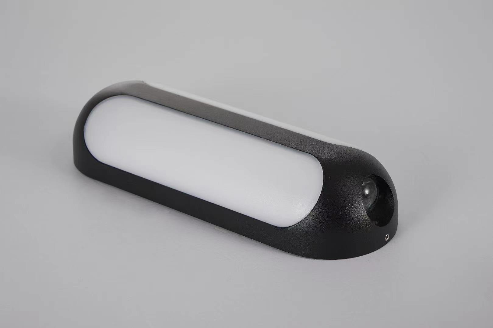 Aplique de pared exterior moderno tipo cápsula, cuerpo ovalado con paneles luminosos verticales dobles y haces de luz ascendentes y descendentes, negro, blanco y gris, HTD-EW4208 4