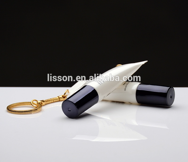 أنبوب بلاستيكي سهل الحمل لتعبئة ملمع الشفاه مع سلسلة مفاتيح 1