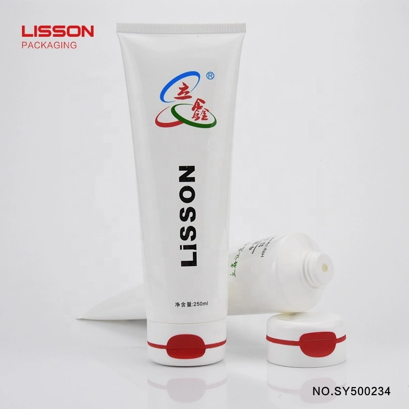 Tubos cosméticos redondos y suaves para limpiador facial con diseño de cerradura y tapa abatible. 1