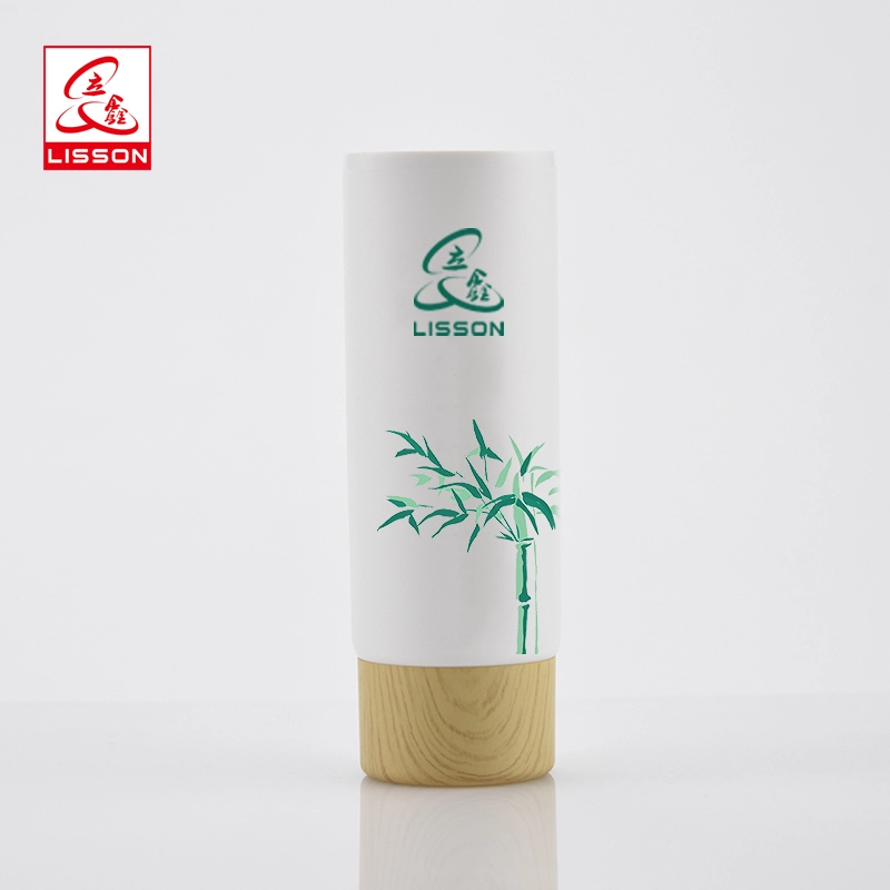 عبوة مستحضرات تجميل خشبية صديقة للبيئة بالجملة من أنبوب البولي إيثيلين مع غطاء لولبي خشبي 1