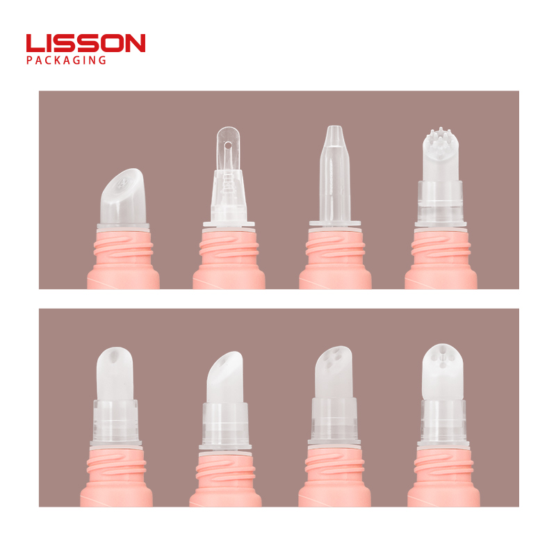 Lip gloss squeeze tube with soft silicone spatula tip