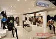 Custom retail clothing wall display design solution Manufacturer | DG Display Showcase 1