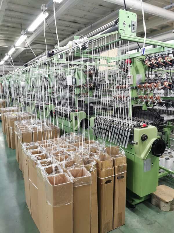 Take off device for needle loom weaving machine parts