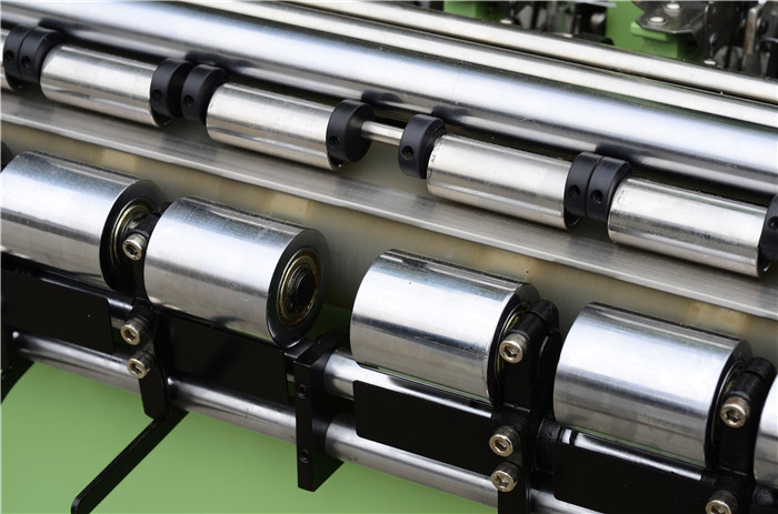 Yongjin - Yongjin automatic plastic/metal zipper tapes making machine needle loom YJ-NF 12/27 10