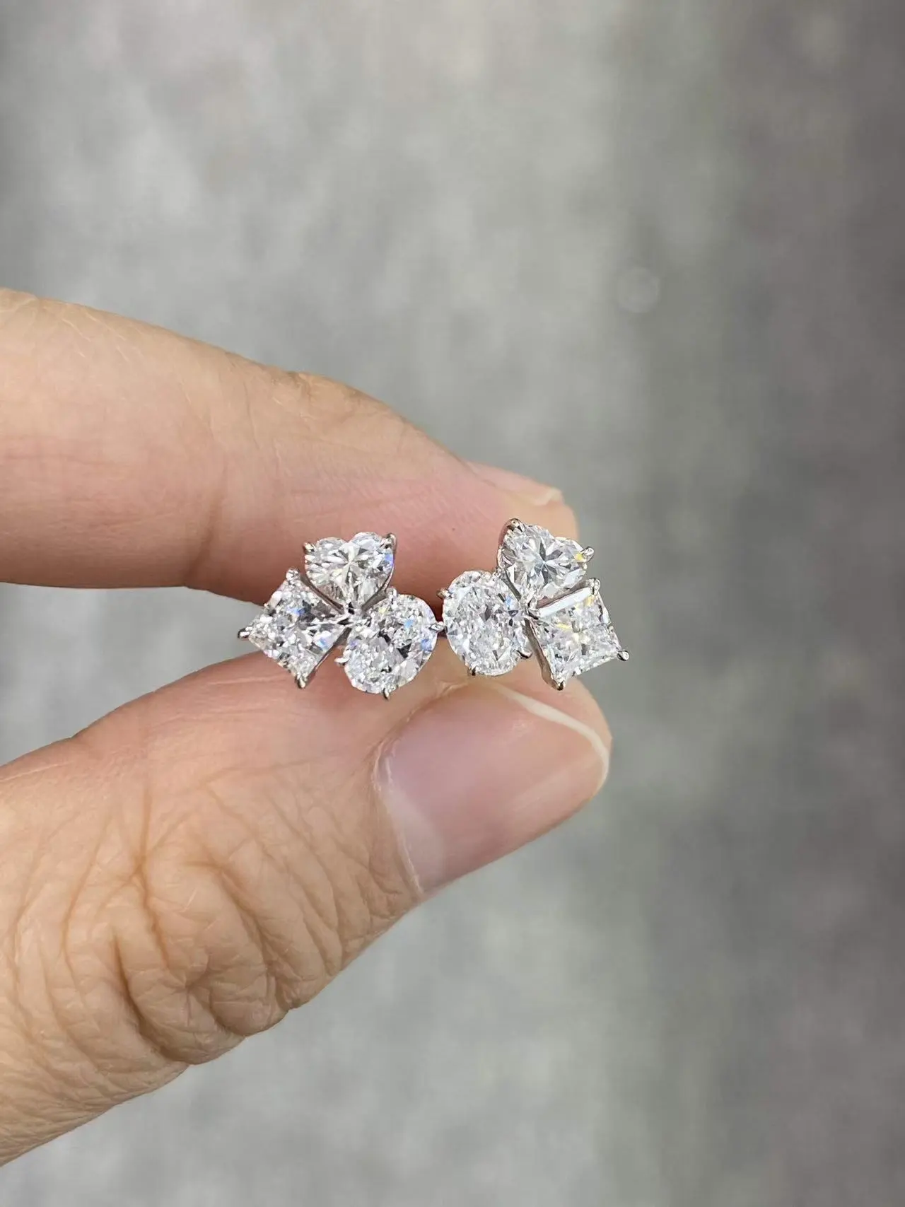 18K white gold heart-shaped and oval, princess-square cut laboratory diamond stud earrings VVS 1